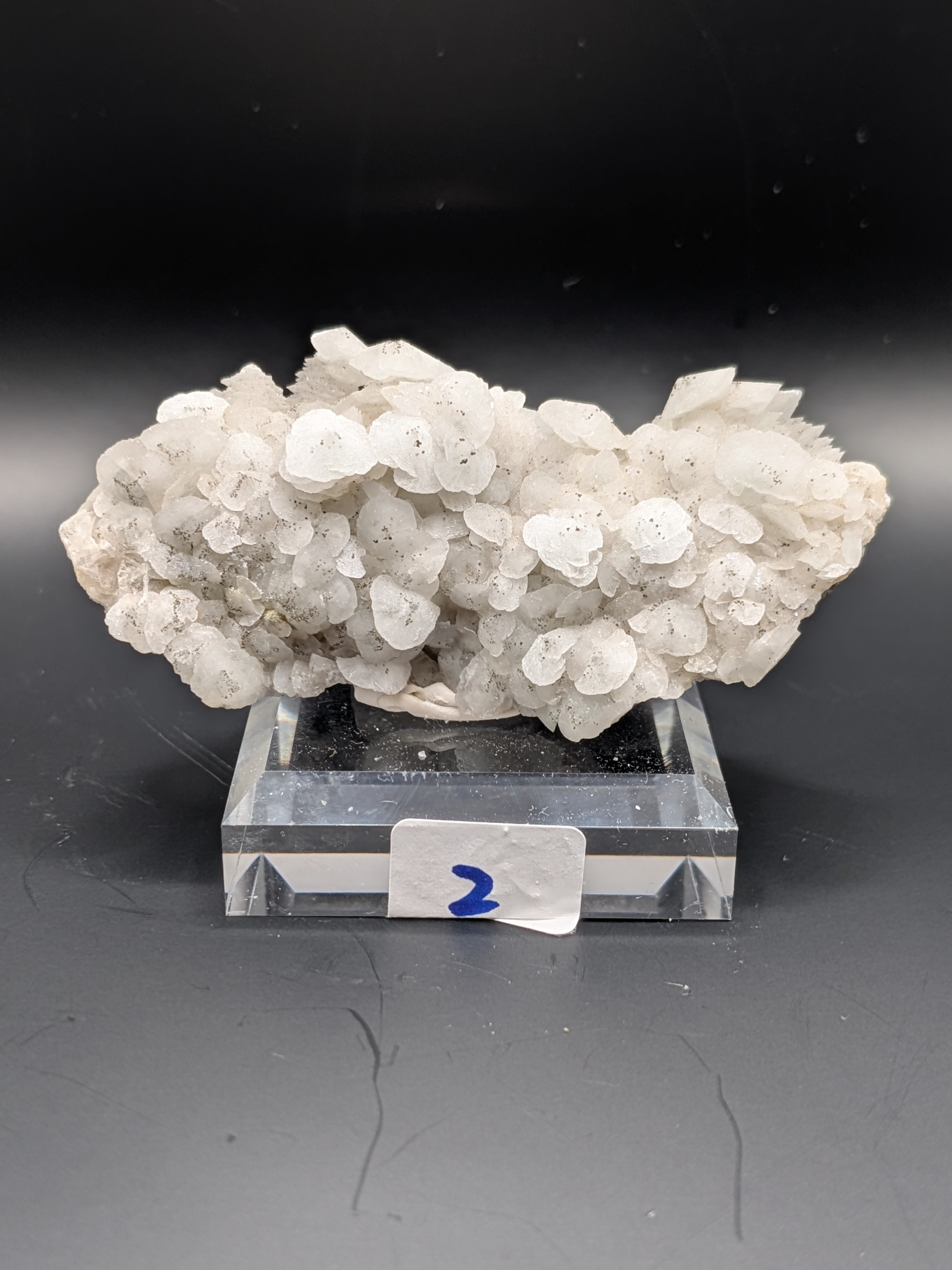 Iron Sulfide with White “Mushroom” Calcite